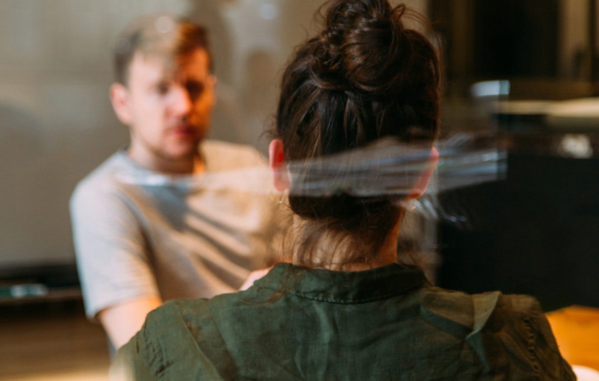 A primary therapist discusses recovery and mental health with a patient at Foundation House.